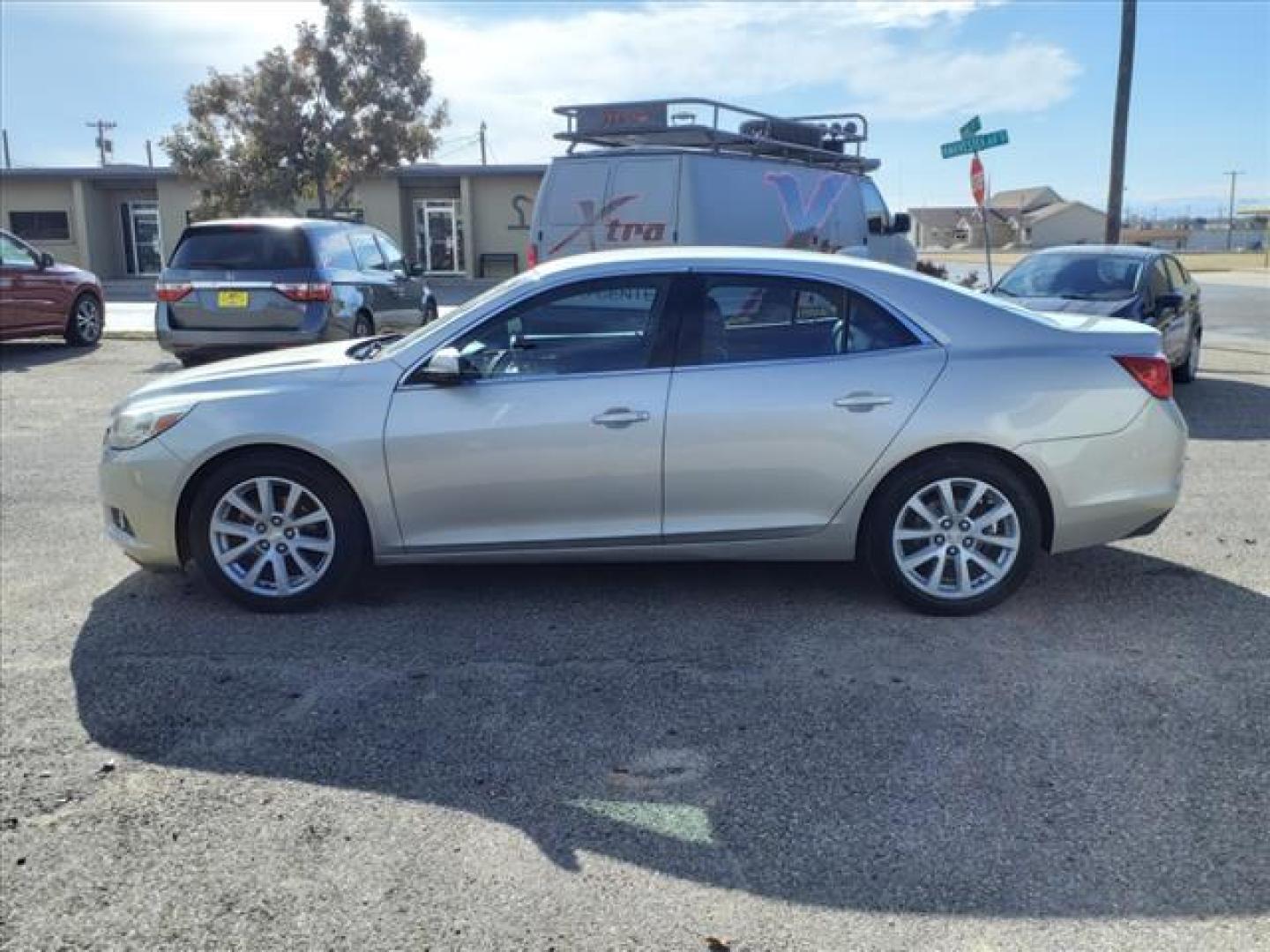 2014 Champagne Silver Metallic Gwt Chevrolet Malibu LT (1G11E5SL9EF) with an 2.5L Ecotec 2.5L I4 196hp 191ft. lbs. Direct Injection engine, 6-Speed Shiftable Automatic w/Overdrive transmission, located at 1401 N. Hobart, Pampa, TX, 79065, (806) 665-9872, 35.549953, -100.975098 - Photo#4