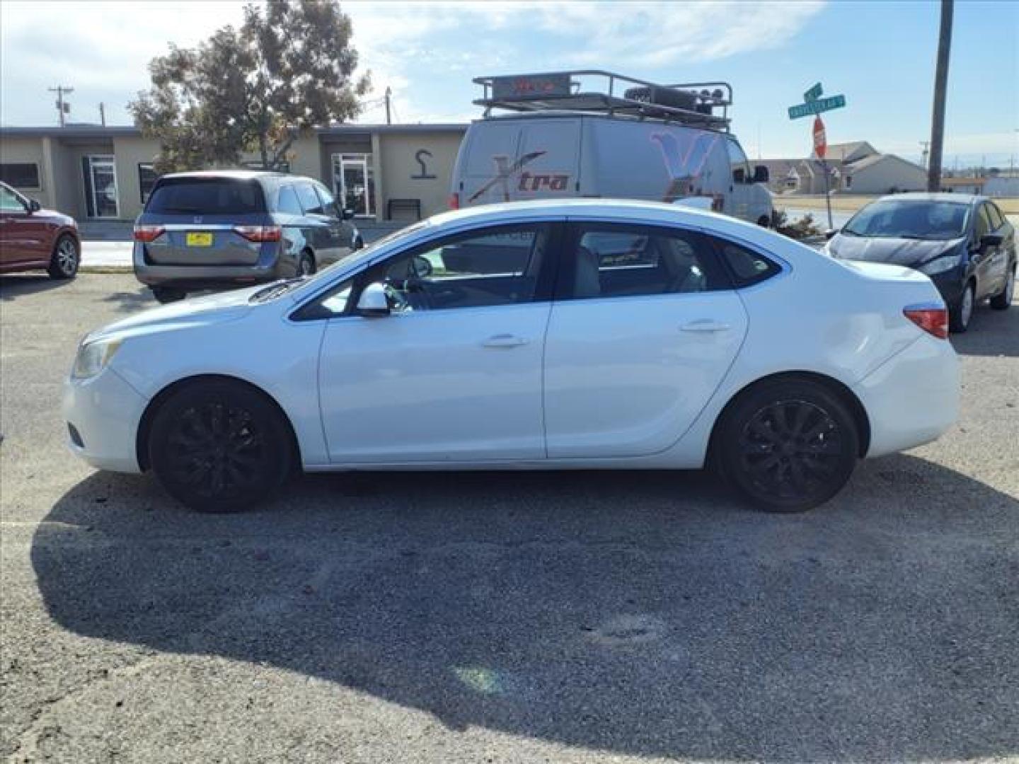 2016 Summit White Gaz Buick Verano Base (1G4PP5SK7G4) with an 2.4L Ecotec 2.4L Flex Fuel I4 180hp 171ft. lbs. Direct Injection engine, 6-Speed Shiftable Automatic w/Overdrive transmission, located at 1401 N. Hobart, Pampa, TX, 79065, (806) 665-9872, 35.549953, -100.975098 - Photo#4