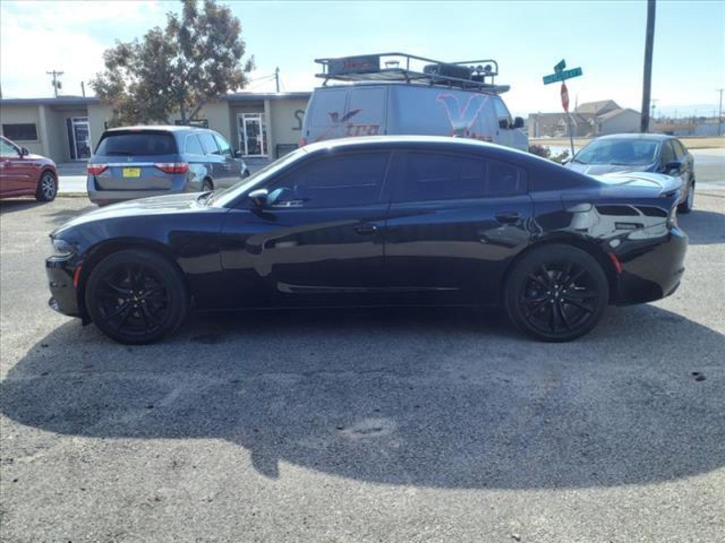 2018 Pitch Black Clear Coat Px8 Dodge Charger SXT (2C3CDXBG8JH) with an 3.6L Pentastar 3.6L V6 292hp 260ft. lbs. Sequential Multiport Fuel Injection engine, 8-Speed Shiftable Automatic transmission, located at 1401 N. Hobart, Pampa, TX, 79065, (806) 665-9872, 35.549953, -100.975098 - Photo#4