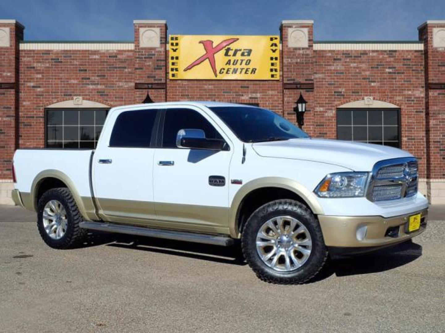 2016 Bright White Clear Coat/White Gold Clear Coat Pw7/ RAM 1500 Laramie Longhorn (1C6RR7PTXGS) with an 5.7L HEMI 5.7L V8 395hp 410ft. lbs. Sequential Multiport Fuel Injection engine, 8-Speed Shiftable Automatic transmission, located at 1401 N. Hobart, Pampa, TX, 79065, (806) 665-9872, 35.549953, -100.975098 - Photo#0