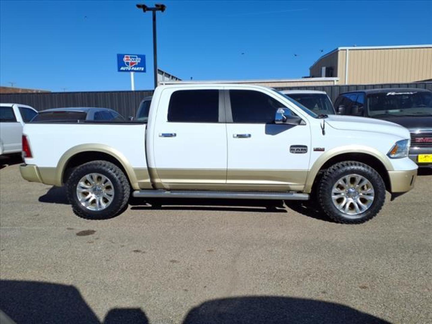 2016 Bright White Clear Coat/White Gold Clear Coat Pw7/ RAM 1500 Laramie Longhorn (1C6RR7PTXGS) with an 5.7L HEMI 5.7L V8 395hp 410ft. lbs. Sequential Multiport Fuel Injection engine, 8-Speed Shiftable Automatic transmission, located at 1401 N. Hobart, Pampa, TX, 79065, (806) 665-9872, 35.549953, -100.975098 - Photo#2