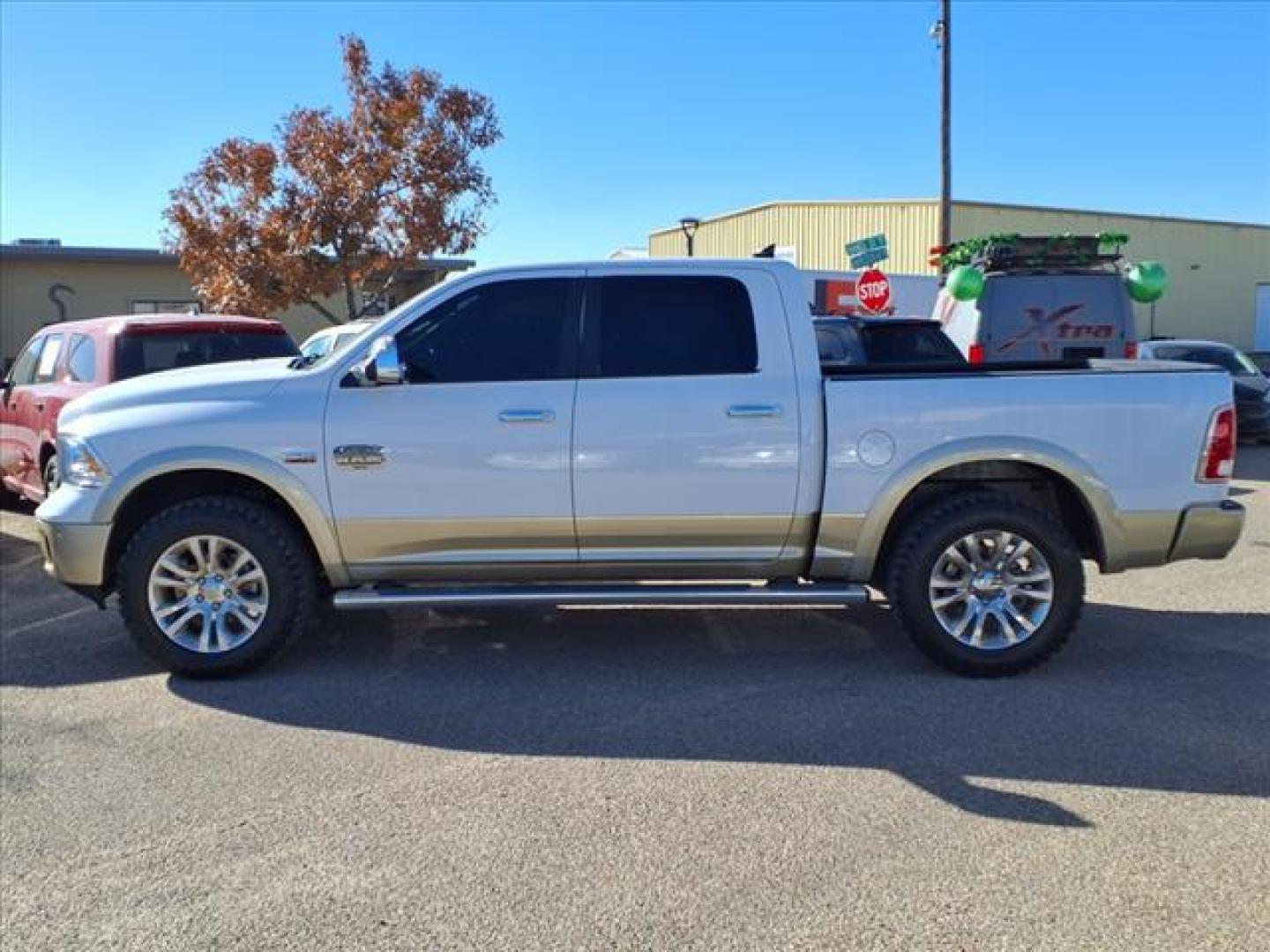 2016 Bright White Clear Coat/White Gold Clear Coat Pw7/ RAM 1500 Laramie Longhorn (1C6RR7PTXGS) with an 5.7L HEMI 5.7L V8 395hp 410ft. lbs. Sequential Multiport Fuel Injection engine, 8-Speed Shiftable Automatic transmission, located at 1401 N. Hobart, Pampa, TX, 79065, (806) 665-9872, 35.549953, -100.975098 - Photo#4