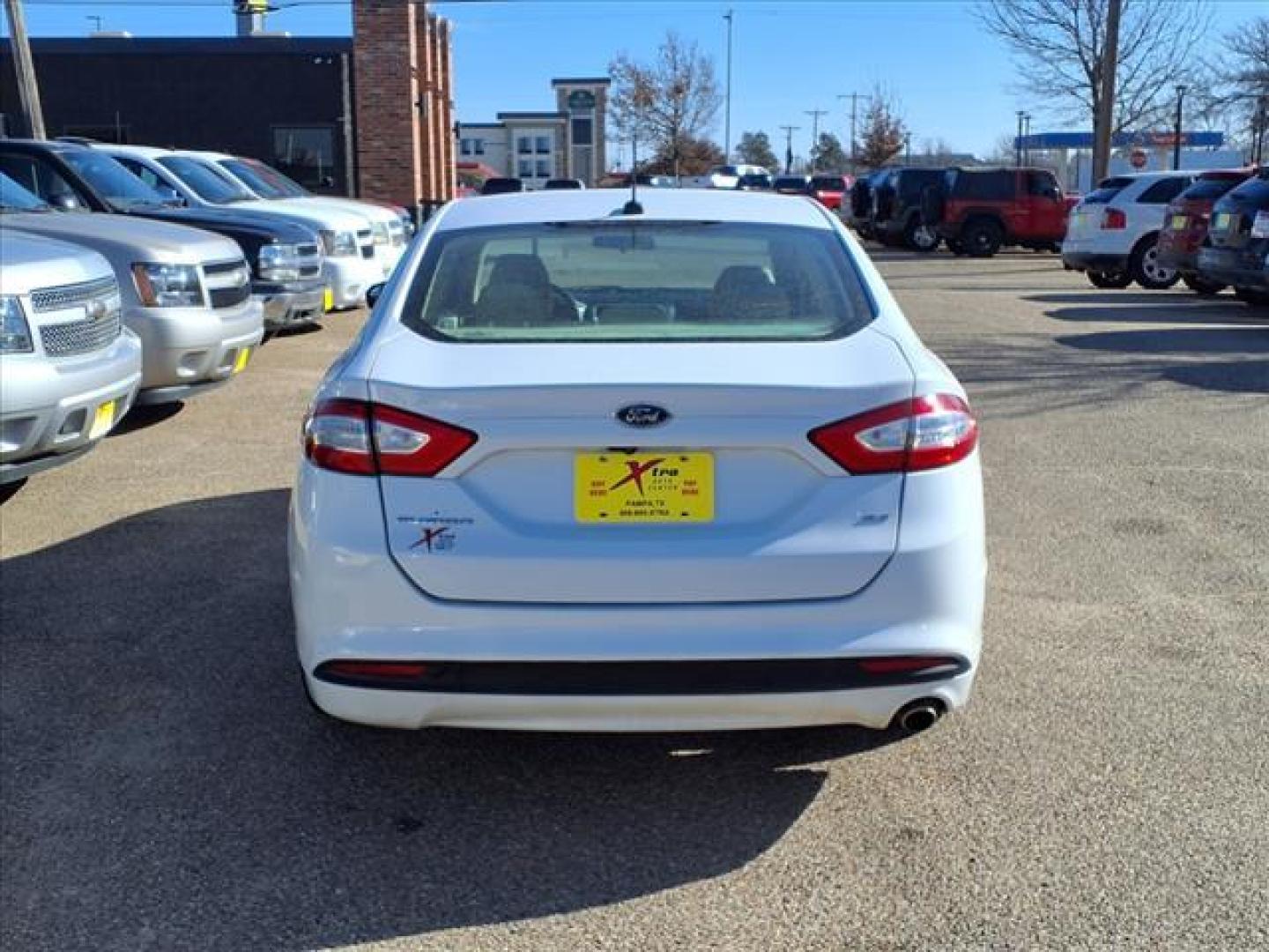 2016 Oxford White Yz Ford Fusion SE (3FA6P0H73GR) with an 2.5L 2.5L I4 175hp 175ft. lbs. Sequential Multiport Fuel Injection engine, 6-Speed Shiftable Automatic transmission, located at 1401 N. Hobart, Pampa, TX, 79065, (806) 665-9872, 35.549953, -100.975098 - Photo#3