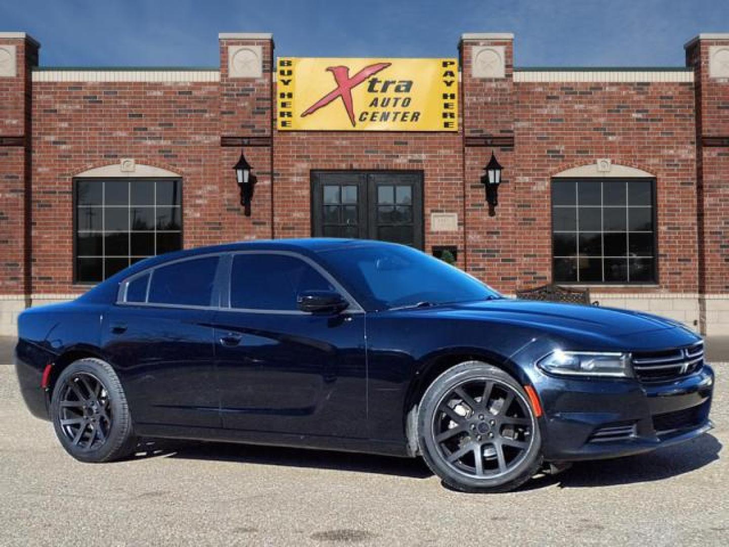 2015 Pitch Black Clear Coat Px8 Dodge Charger SE (2C3CDXBGXFH) with an 3.6L Pentastar 3.6L V6 292hp 260ft. lbs. Sequential Multiport Fuel Injection engine, 8-Speed Shiftable Automatic transmission, located at 1401 N. Hobart, Pampa, TX, 79065, (806) 665-9872, 35.549953, -100.975098 - Photo#0