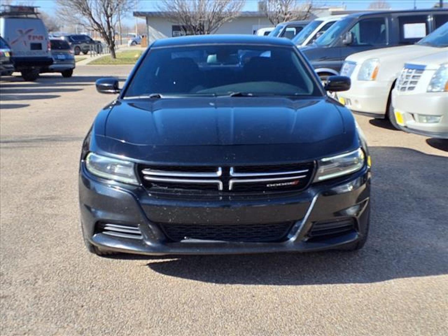 2015 Pitch Black Clear Coat Px8 Dodge Charger SE (2C3CDXBGXFH) with an 3.6L Pentastar 3.6L V6 292hp 260ft. lbs. Sequential Multiport Fuel Injection engine, 8-Speed Shiftable Automatic transmission, located at 1401 N. Hobart, Pampa, TX, 79065, (806) 665-9872, 35.549953, -100.975098 - Photo#1