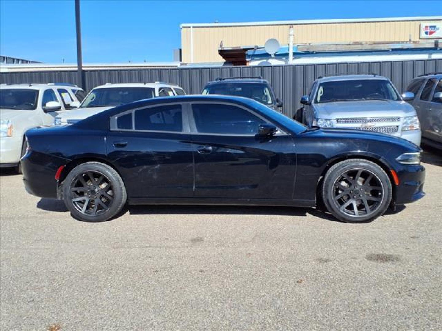 2015 Pitch Black Clear Coat Px8 Dodge Charger SE (2C3CDXBGXFH) with an 3.6L Pentastar 3.6L V6 292hp 260ft. lbs. Sequential Multiport Fuel Injection engine, 8-Speed Shiftable Automatic transmission, located at 1401 N. Hobart, Pampa, TX, 79065, (806) 665-9872, 35.549953, -100.975098 - Photo#2