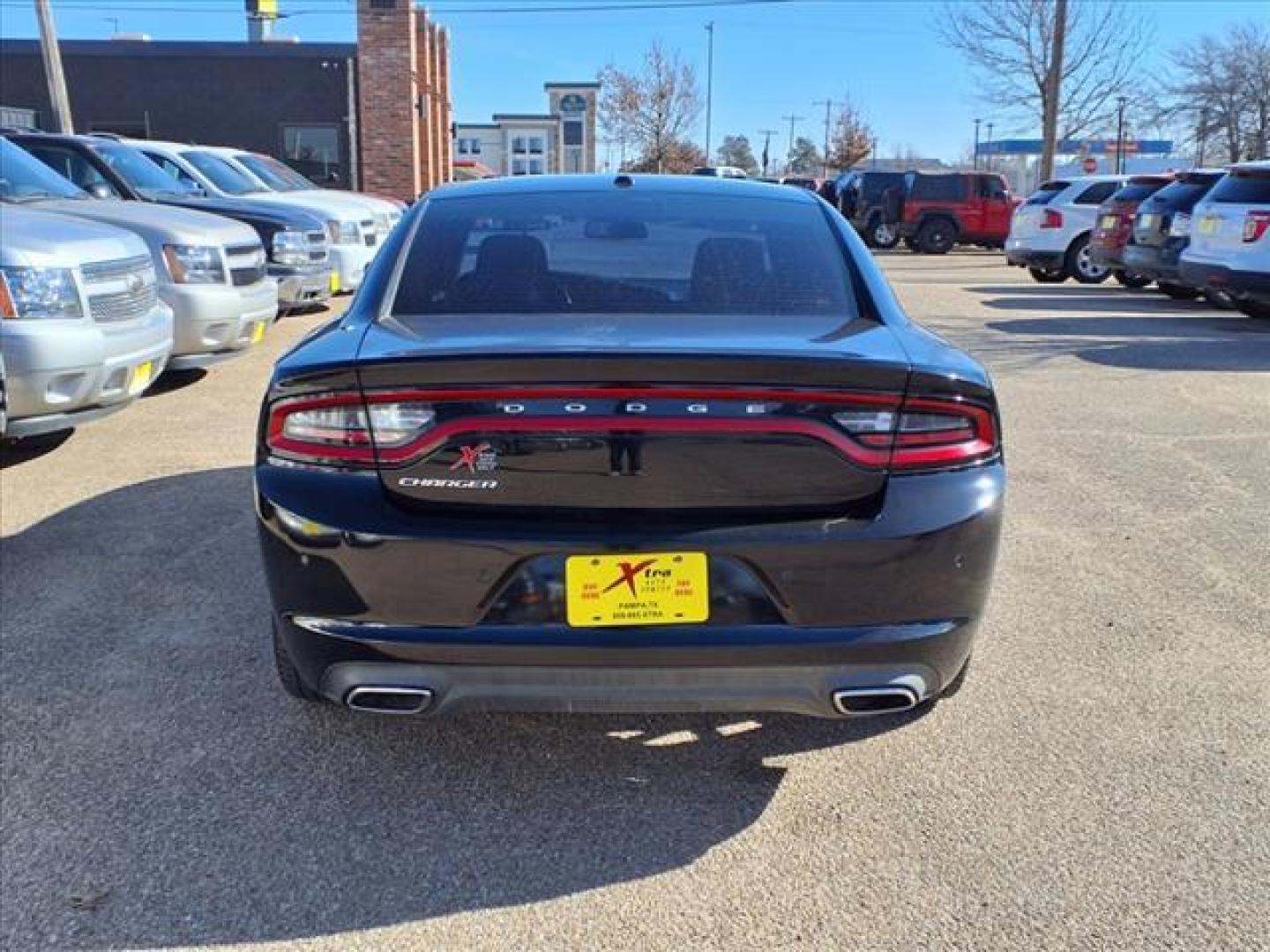 2015 Pitch Black Clear Coat Px8 Dodge Charger SE (2C3CDXBGXFH) with an 3.6L Pentastar 3.6L V6 292hp 260ft. lbs. Sequential Multiport Fuel Injection engine, 8-Speed Shiftable Automatic transmission, located at 1401 N. Hobart, Pampa, TX, 79065, (806) 665-9872, 35.549953, -100.975098 - Photo#3