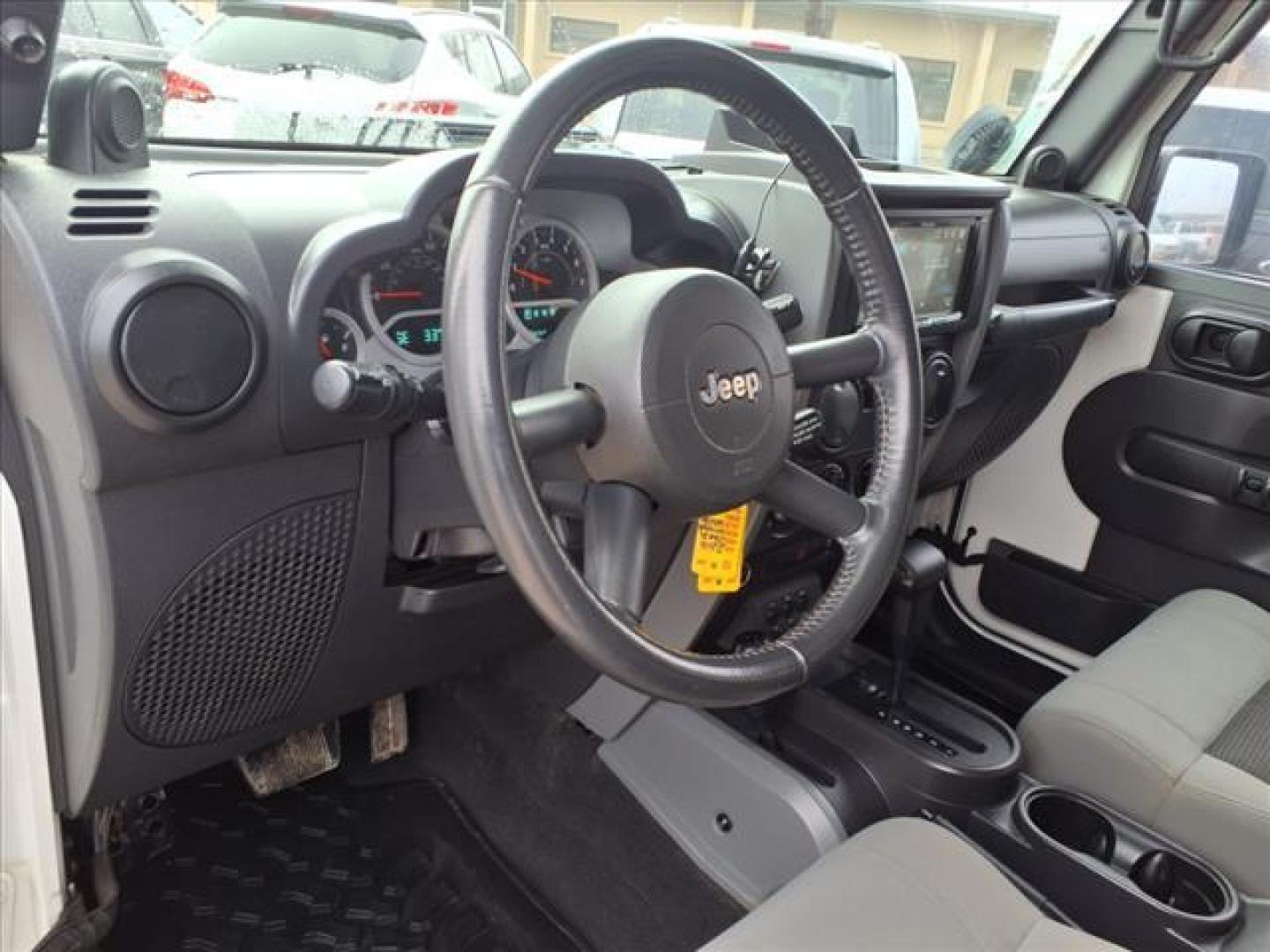 2010 Stone White Clear Coat Pw1 Jeep Wrangler Sport (1J4AA2D10AL) with an 3.8L 3.8L V6 202hp 237ft. lbs. Sequential Multiport Fuel Injection engine, 4-Speed Automatic transmission, located at 1401 N. Hobart, Pampa, TX, 79065, (806) 665-9872, 35.549953, -100.975098 - Photo#9