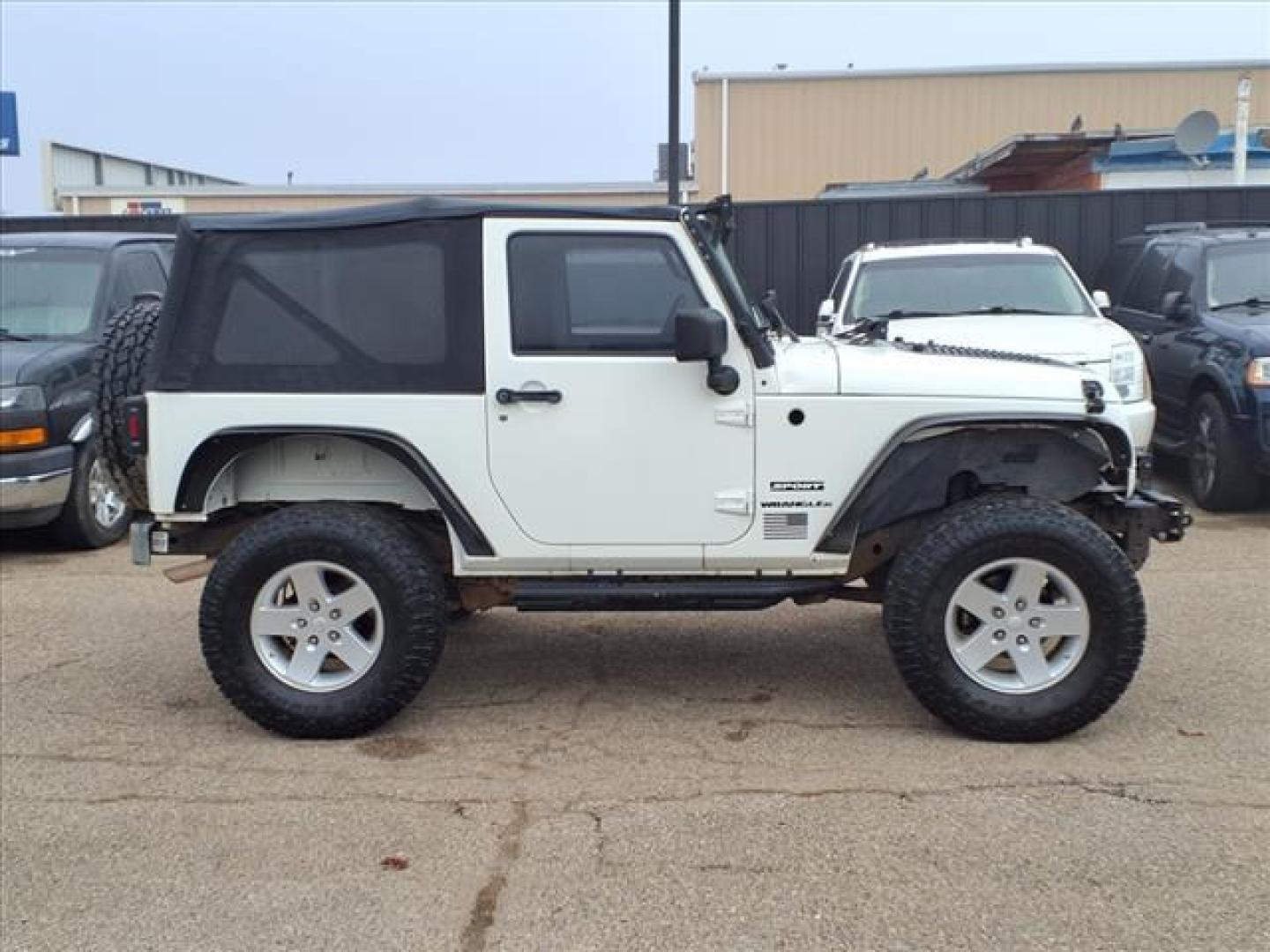 2010 Stone White Clear Coat Pw1 Jeep Wrangler Sport (1J4AA2D10AL) with an 3.8L 3.8L V6 202hp 237ft. lbs. Sequential Multiport Fuel Injection engine, 4-Speed Automatic transmission, located at 1401 N. Hobart, Pampa, TX, 79065, (806) 665-9872, 35.549953, -100.975098 - Photo#2