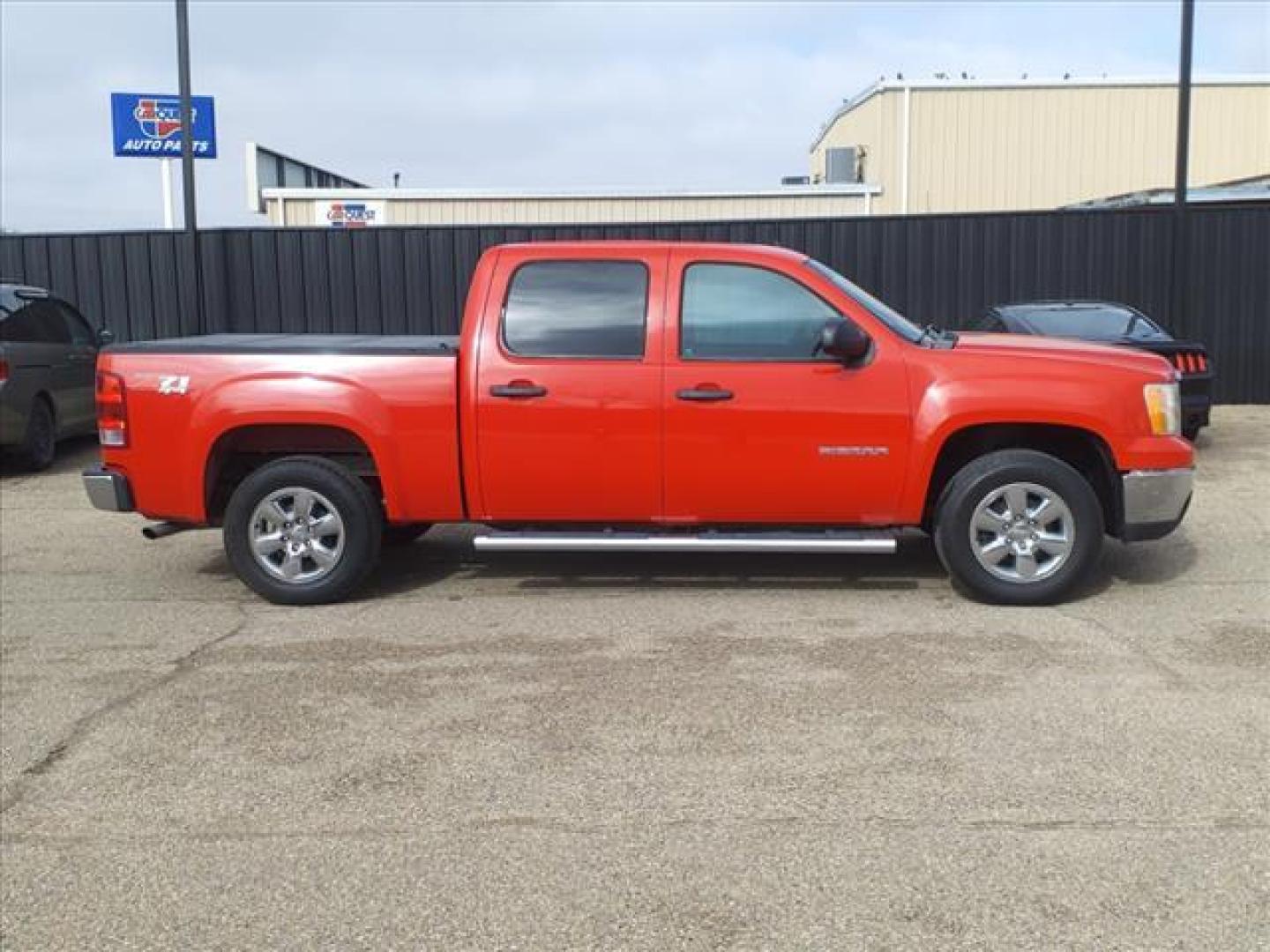 2013 Fire Red GMC Sierra 1500 SLE (3GTP2VE71DG) with an 5.3L Vortec 5.3L Flex Fuel V8 315hp 335ft. lbs. Sequential-Port F.I. engine, 6-Speed Shiftable Automatic transmission, located at 1401 N. Hobart, Pampa, TX, 79065, (806) 665-9872, 35.549953, -100.975098 - Photo#2