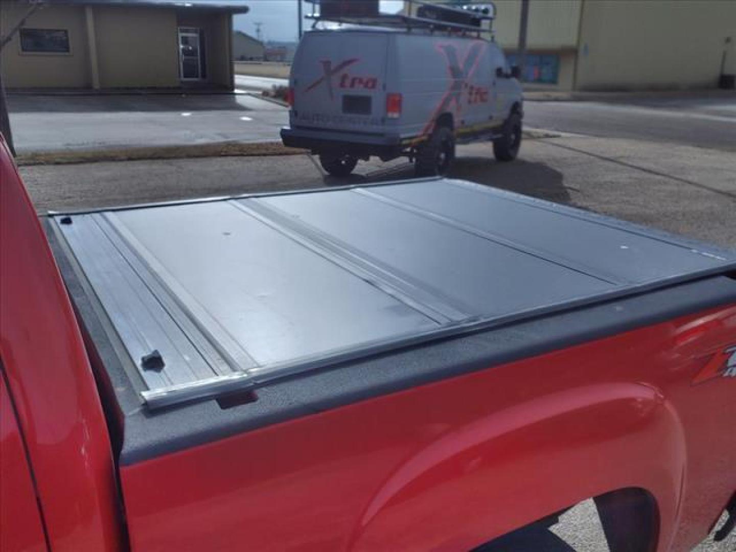 2013 Fire Red GMC Sierra 1500 SLE (3GTP2VE71DG) with an 5.3L Vortec 5.3L Flex Fuel V8 315hp 335ft. lbs. Sequential-Port F.I. engine, 6-Speed Shiftable Automatic transmission, located at 1401 N. Hobart, Pampa, TX, 79065, (806) 665-9872, 35.549953, -100.975098 - Photo#5