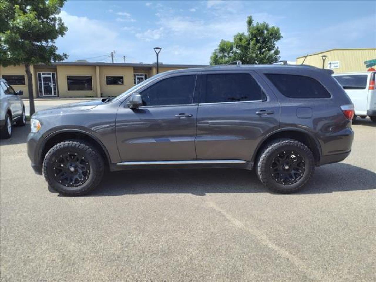 2013 Brilliant Black Crystal Pearl Coat Dodge Durango SXT (1C4RDJAG1DC) with an 3.6L 3.6L V6 280hp 260ft. lbs. Sequential Multiport Fuel Injection engine, 5-Speed Automatic transmission, located at 1401 N. Hobart, Pampa, TX, 79065, (806) 665-9872, 35.549953, -100.975098 - Photo#4