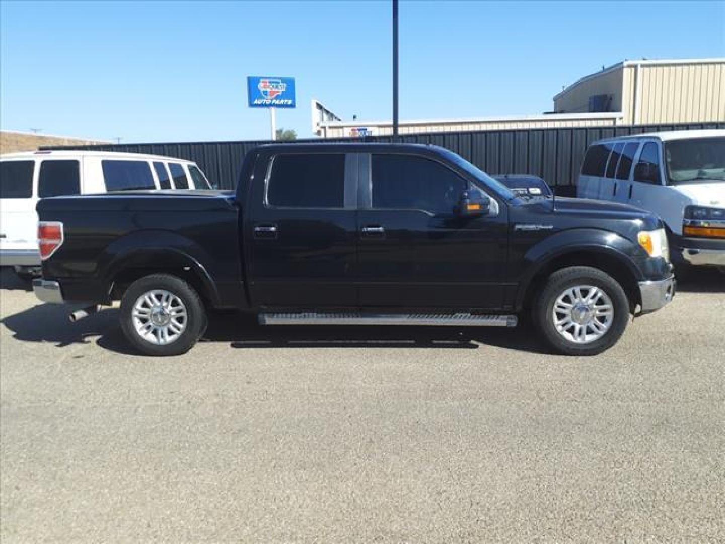 2013 Tuxedo Black Metallic Ford F-150 Lariat (1FTFW1CF7DK) with an 5.0L 5.0L Flex Fuel V8 360hp 380ft. lbs. Sequential Multiport Fuel Injection engine, 6-Speed Shiftable Automatic transmission, located at 1401 N. Hobart, Pampa, TX, 79065, (806) 665-9872, 35.549953, -100.975098 - Photo#2