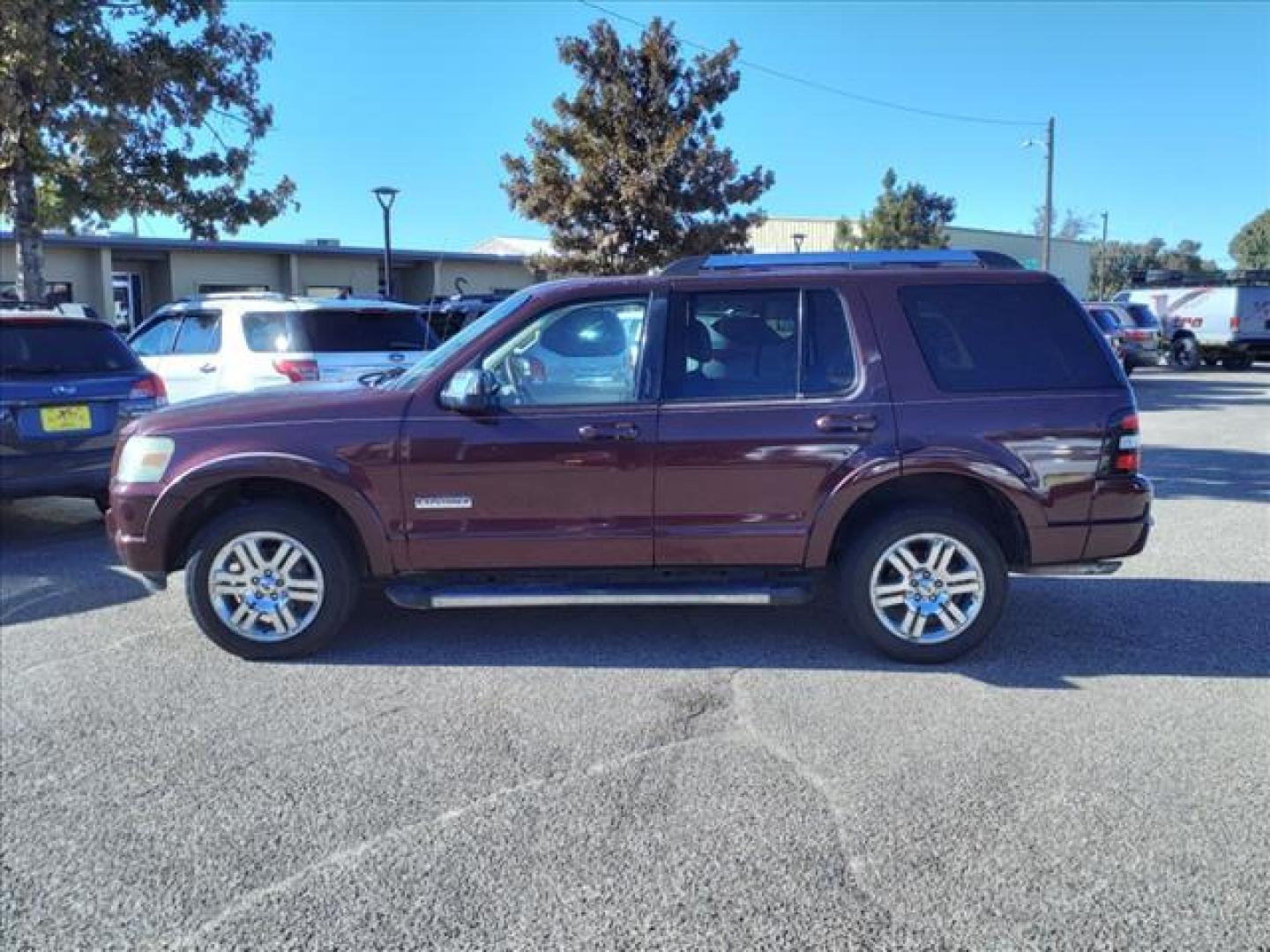 2006 Dark Cherry Clearcoat Metallic Hh Ford Explorer Limited (1FMEU65856U) with an 4.6L 4L NA V8 single overhead cam (SOHC) 24V Fuel Injected engine, 6-Speed Automatic transmission, located at 1401 N. Hobart, Pampa, TX, 79065, (806) 665-9872, 35.549953, -100.975098 - Photo#4