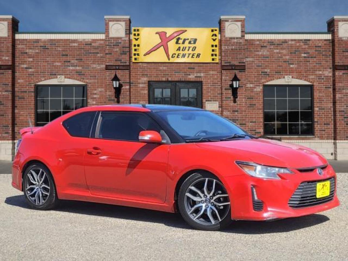 2015 Absolutely Red Scion tC Base (JTKJF5C71F3) with an 2.5L 2.5L I4 179hp 172ft. lbs. Sequential Multiport Fuel Injection engine, 6-Speed Manual transmission, located at 1401 N. Hobart, Pampa, TX, 79065, (806) 665-9872, 35.549953, -100.975098 - Photo#0