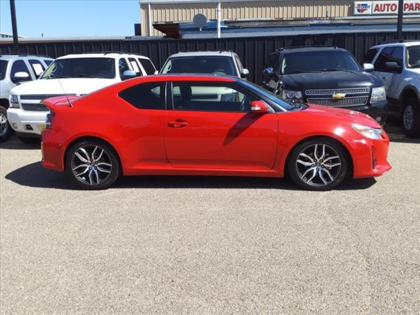 2015 Absolutely Red Scion tC Base (JTKJF5C71F3) with an 2.5L 2.5L I4 179hp 172ft. lbs. Sequential Multiport Fuel Injection engine, 6-Speed Manual transmission, located at 1401 N. Hobart, Pampa, TX, 79065, (806) 665-9872, 35.549953, -100.975098 - Photo#2