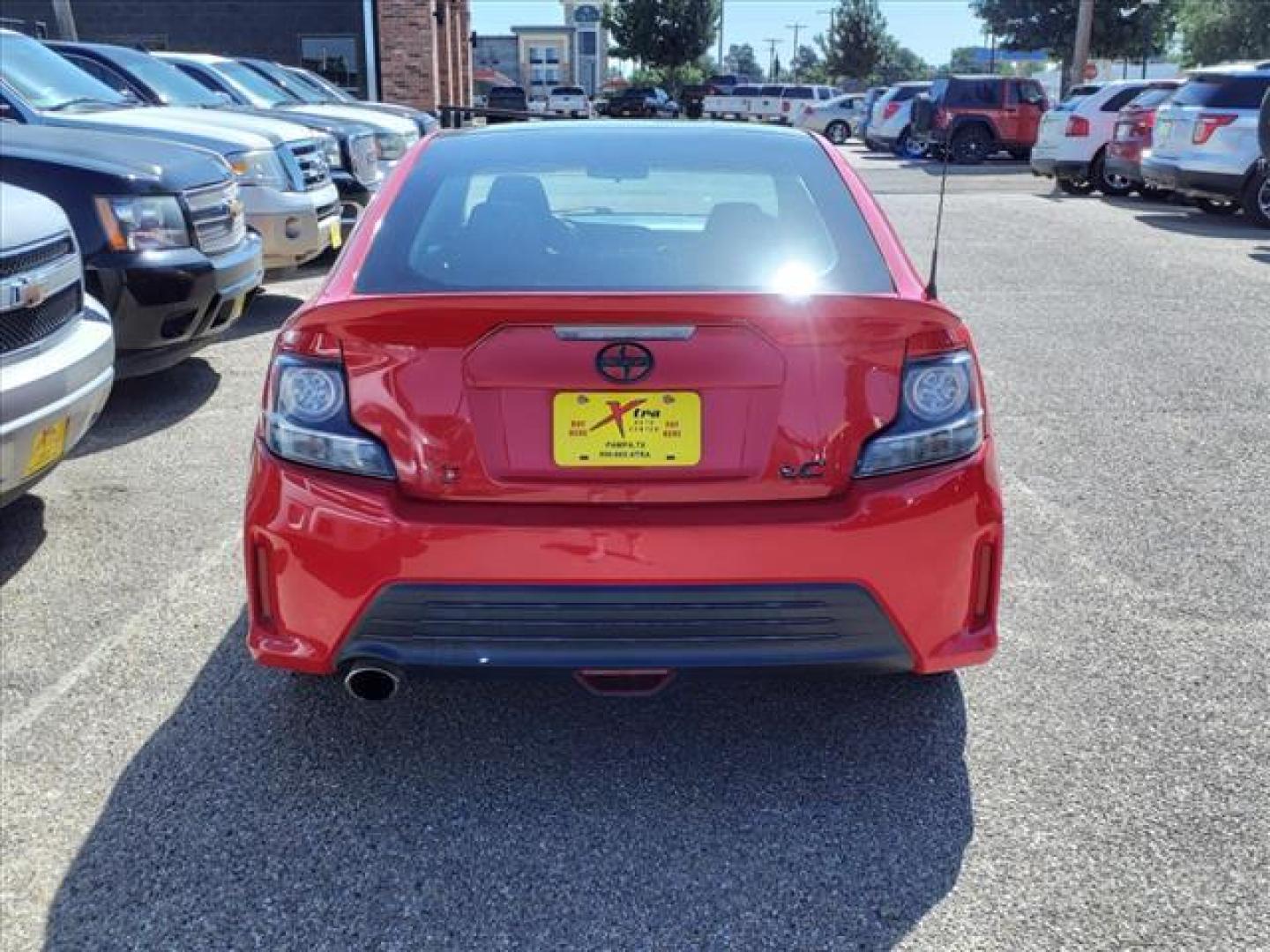 2015 Absolutely Red Scion tC Base (JTKJF5C71F3) with an 2.5L 2.5L I4 179hp 172ft. lbs. Sequential Multiport Fuel Injection engine, 6-Speed Manual transmission, located at 1401 N. Hobart, Pampa, TX, 79065, (806) 665-9872, 35.549953, -100.975098 - Photo#3