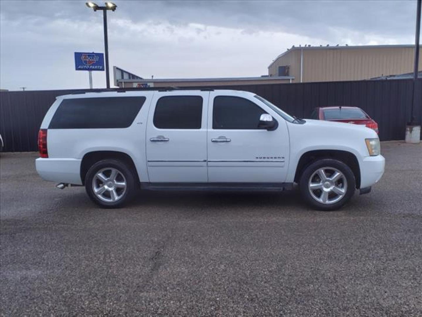 2011 Summit White Chevrolet Suburban LTZ (1GNSCKE0XBR) with an 5.3L Vortec Iron Block 5.3L Flex Fuel V8 320hp 335ft. lbs. Sequential-Port F.I. engine, 6-Speed Shiftable Automatic transmission, located at 1401 N. Hobart, Pampa, TX, 79065, (806) 665-9872, 35.549953, -100.975098 - Photo#2