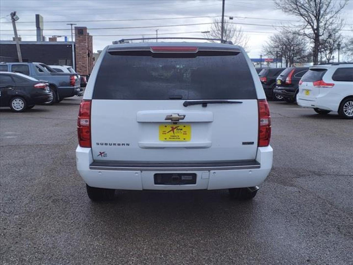 2011 Summit White Chevrolet Suburban LTZ (1GNSCKE0XBR) with an 5.3L Vortec Iron Block 5.3L Flex Fuel V8 320hp 335ft. lbs. Sequential-Port F.I. engine, 6-Speed Shiftable Automatic transmission, located at 1401 N. Hobart, Pampa, TX, 79065, (806) 665-9872, 35.549953, -100.975098 - Photo#3