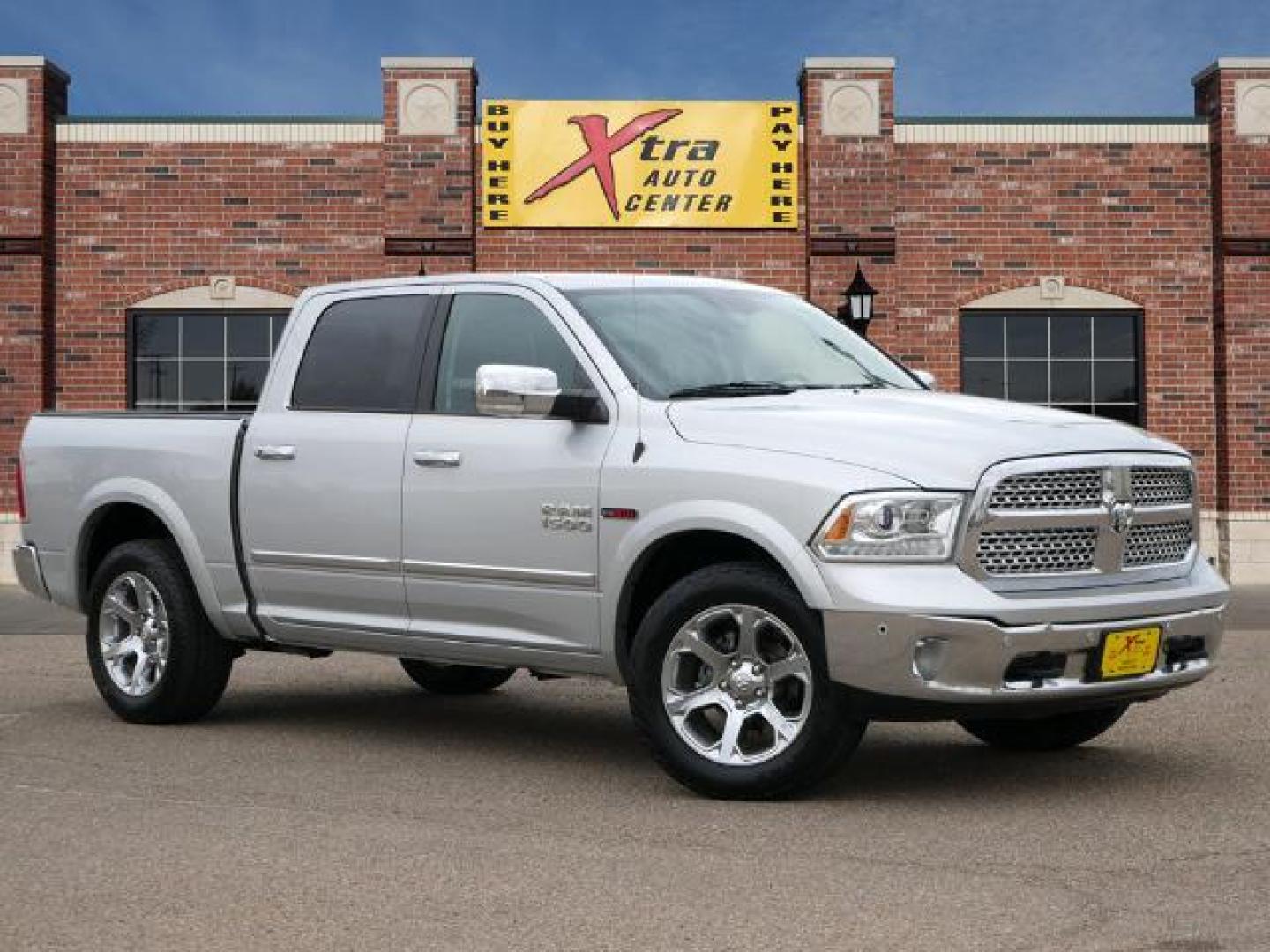 2015 Bright Silver Metallic Clear Coat RAM 1500 Laramie (1C6RR7NM2FS) with an 3.0 6 Cylinder Common Rail Direct Injection engine, Automatic transmission, located at 1401 N. Hobart, Pampa, TX, 79065, (806) 665-9872, 35.549953, -100.975098 - Photo#0