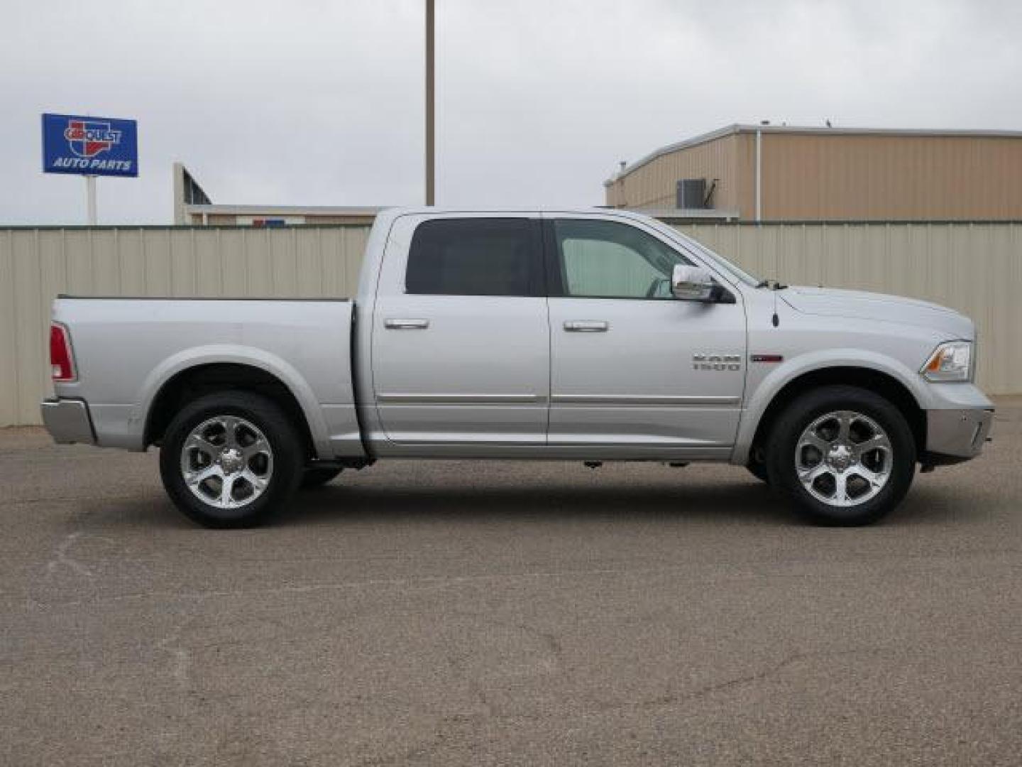 2015 Bright Silver Metallic Clear Coat RAM 1500 Laramie (1C6RR7NM2FS) with an 3.0 6 Cylinder Common Rail Direct Injection engine, Automatic transmission, located at 1401 N. Hobart, Pampa, TX, 79065, (806) 665-9872, 35.549953, -100.975098 - Photo#2