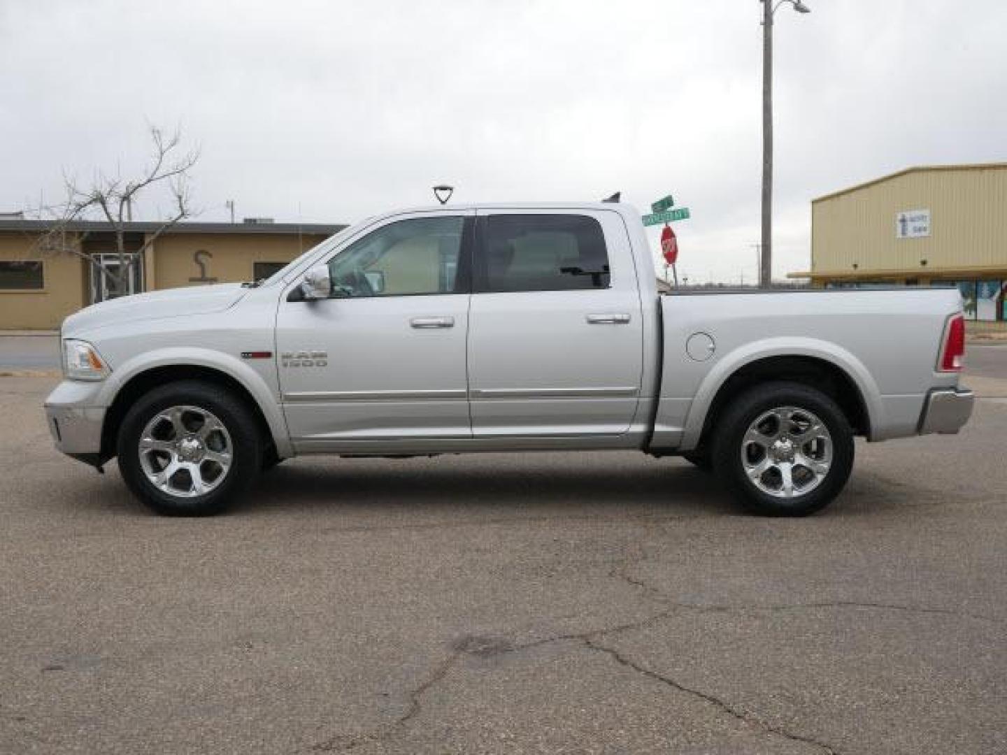 2015 Bright Silver Metallic Clear Coat RAM 1500 Laramie (1C6RR7NM2FS) with an 3.0 6 Cylinder Common Rail Direct Injection engine, Automatic transmission, located at 1401 N. Hobart, Pampa, TX, 79065, (806) 665-9872, 35.549953, -100.975098 - Photo#4