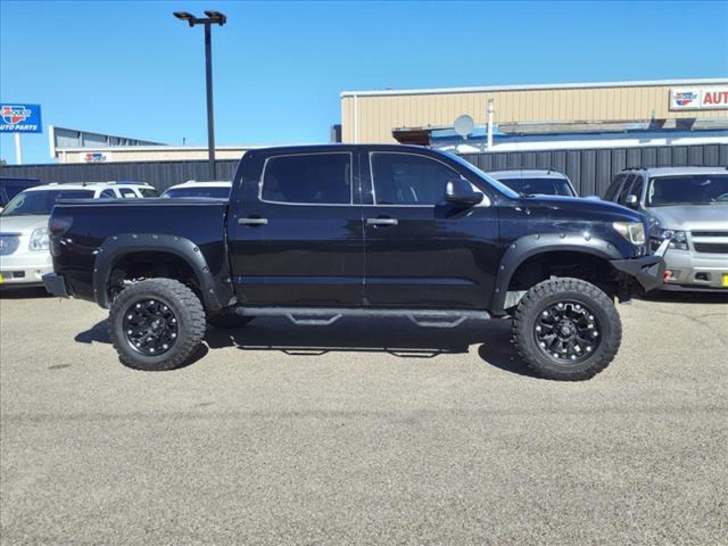 2012 Black 202 Toyota Tundra Grade (5TFDW5F19CX) with an 5.7L 5.7L Flex Fuel V8 381hp 401ft. lbs. Sequential Multiport Fuel Injection engine, 6-Speed Shiftable Automatic transmission, located at 1401 N. Hobart, Pampa, TX, 79065, (806) 665-9872, 35.549953, -100.975098 - Photo#2