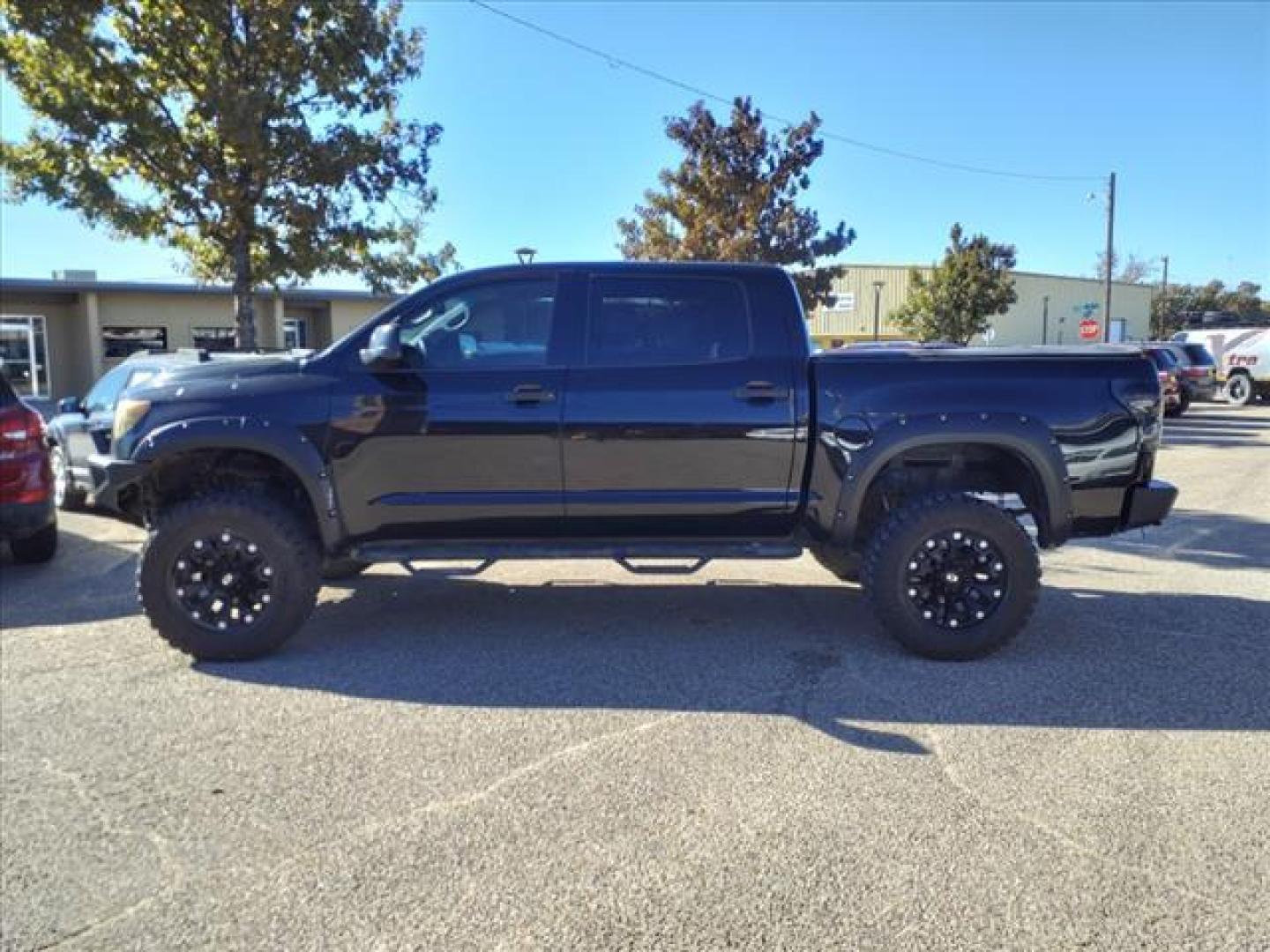 2012 Black 202 Toyota Tundra Grade (5TFDW5F19CX) with an 5.7L 5.7L Flex Fuel V8 381hp 401ft. lbs. Sequential Multiport Fuel Injection engine, 6-Speed Shiftable Automatic transmission, located at 1401 N. Hobart, Pampa, TX, 79065, (806) 665-9872, 35.549953, -100.975098 - Photo#4