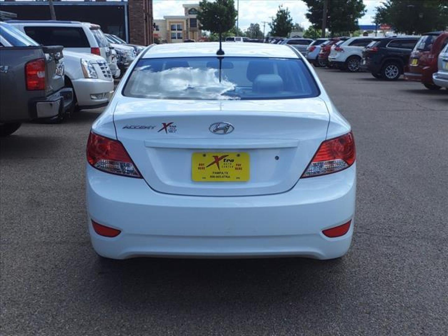 2014 Century White Hyundai ACCENT GLS (KMHCT4AE8EU) with an 1.6L 1.6L I4 138hp 123ft. lbs. Direct Injection engine, 6-Speed Shiftable Automatic transmission, located at 1401 N. Hobart, Pampa, TX, 79065, (806) 665-9872, 35.549953, -100.975098 - Photo#3