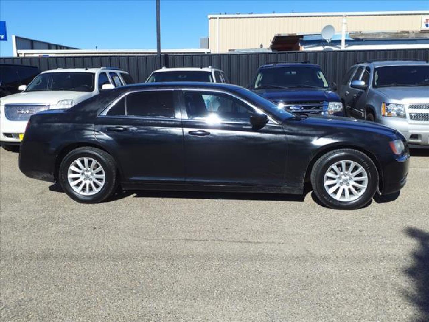 2013 Gloss Black Px8 Chrysler 300 Base (2C3CCAAG1DH) with an 3.6L Pentastar 3.6L V6 292hp 260ft. lbs. Sequential Multiport Fuel Injection engine, Automatic transmission, located at 1401 N. Hobart, Pampa, TX, 79065, (806) 665-9872, 35.549953, -100.975098 - Photo#2