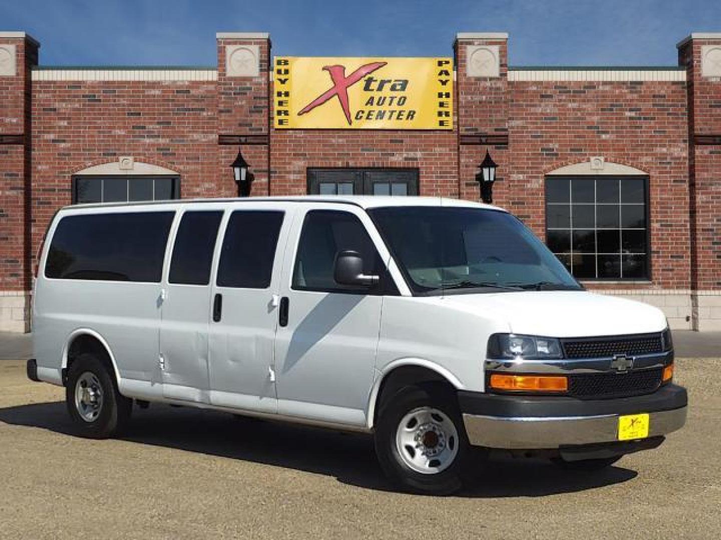 2012 Summit White Chevrolet Express Passenger LT 3500 (1GAZG1FG9C1) with an 6.0L 4.8L Flex Fuel V8 280hp 2 Sequential-Port F.I. engine, 6-Speed Shiftable Automatic transmission, located at 1401 N. Hobart, Pampa, TX, 79065, (806) 665-9872, 35.549953, -100.975098 - Photo#0