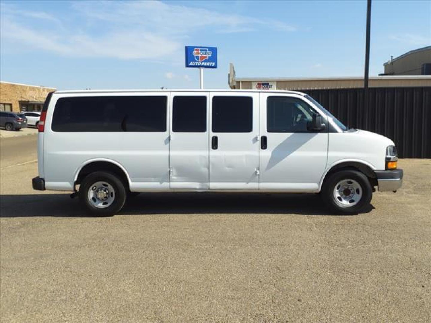 2012 Summit White Chevrolet Express Passenger LT 3500 (1GAZG1FG9C1) with an 6.0L 4.8L Flex Fuel V8 280hp 2 Sequential-Port F.I. engine, 6-Speed Shiftable Automatic transmission, located at 1401 N. Hobart, Pampa, TX, 79065, (806) 665-9872, 35.549953, -100.975098 - Photo#2