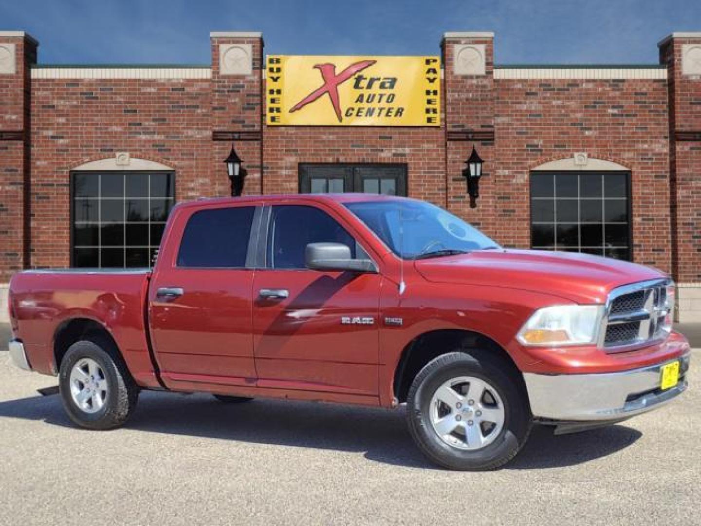 2009 Inferno Red Crystal Pearl Coat Dodge Ram 1500 SLT (1D3HV13T79S) with an 5.7L HEMI 5.7L V8 390hp 407ft. lbs. Sequential Multiport Fuel Injection engine, 5-Speed Automatic transmission, located at 1401 N. Hobart, Pampa, TX, 79065, (806) 665-9872, 35.549953, -100.975098 - Photo#0