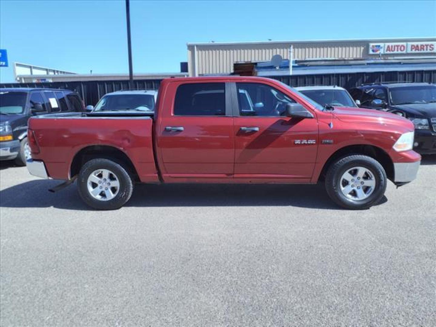 2009 Inferno Red Crystal Pearl Coat Dodge Ram 1500 SLT (1D3HV13T79S) with an 5.7L HEMI 5.7L V8 390hp 407ft. lbs. Sequential Multiport Fuel Injection engine, 5-Speed Automatic transmission, located at 1401 N. Hobart, Pampa, TX, 79065, (806) 665-9872, 35.549953, -100.975098 - Photo#2