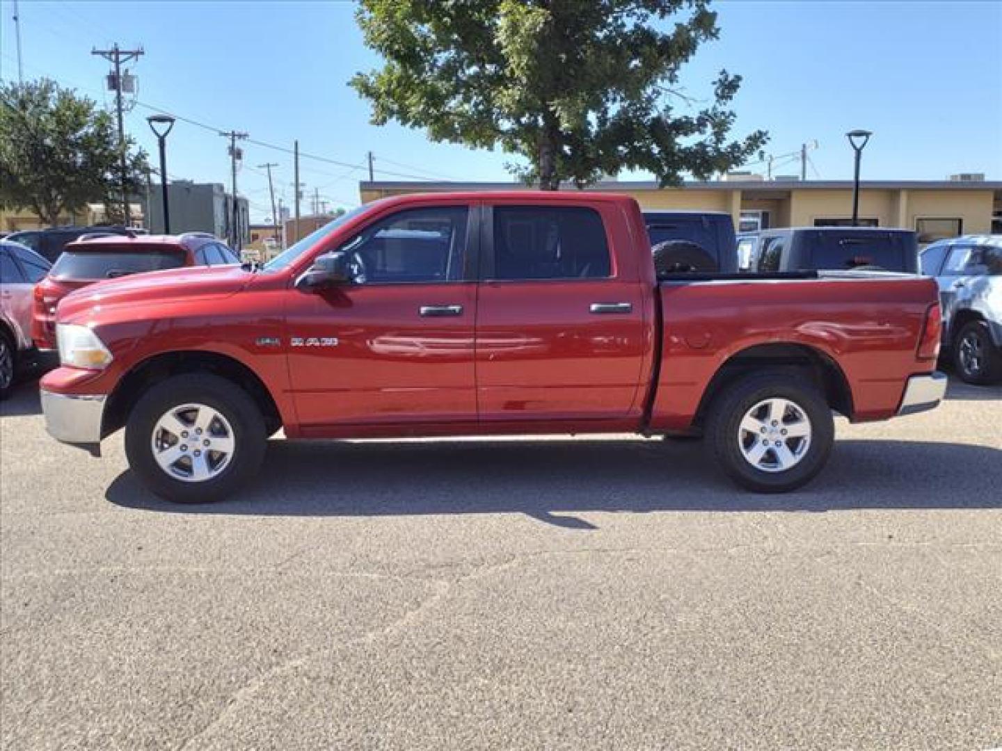 2009 Inferno Red Crystal Pearl Coat Dodge Ram 1500 SLT (1D3HV13T79S) with an 5.7L HEMI 5.7L V8 390hp 407ft. lbs. Sequential Multiport Fuel Injection engine, 5-Speed Automatic transmission, located at 1401 N. Hobart, Pampa, TX, 79065, (806) 665-9872, 35.549953, -100.975098 - Photo#4