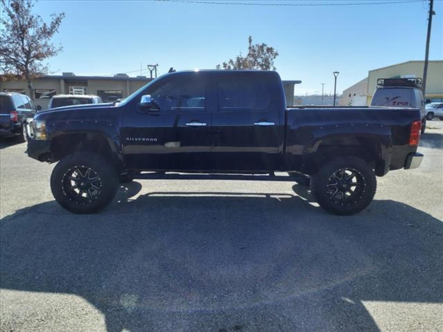 2013 Black Chevrolet Silverado 1500 LT (3GCPKSE27DG) with an 6.2L Vortec 6.2L Flex Fuel V8 Sequential-Port F.I. engine, 6-Speed Shiftable Automatic transmission, located at 1401 N. Hobart, Pampa, TX, 79065, (806) 665-9872, 35.549953, -100.975098 - Photo#4