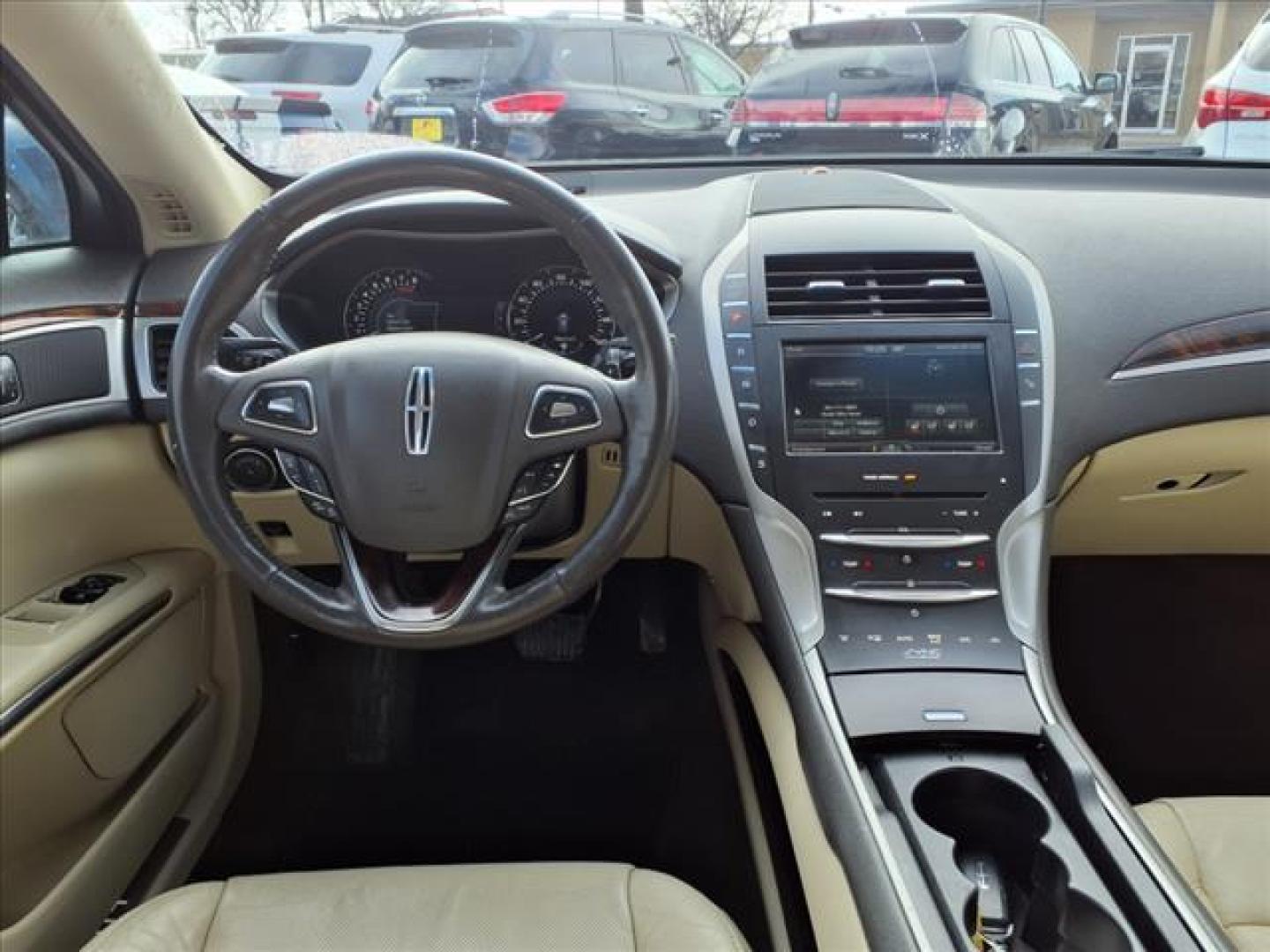 2014 Sunset Metallic D7 Lincoln MKZ Base (3LN6L2GK5ER) with an 3.7L 3.7L V6 300hp 277ft. lbs. Sequential Multiport Fuel Injection engine, 6-Speed Shiftable Automatic transmission, located at 1401 N. Hobart, Pampa, TX, 79065, (806) 665-9872, 35.549953, -100.975098 - Photo#12