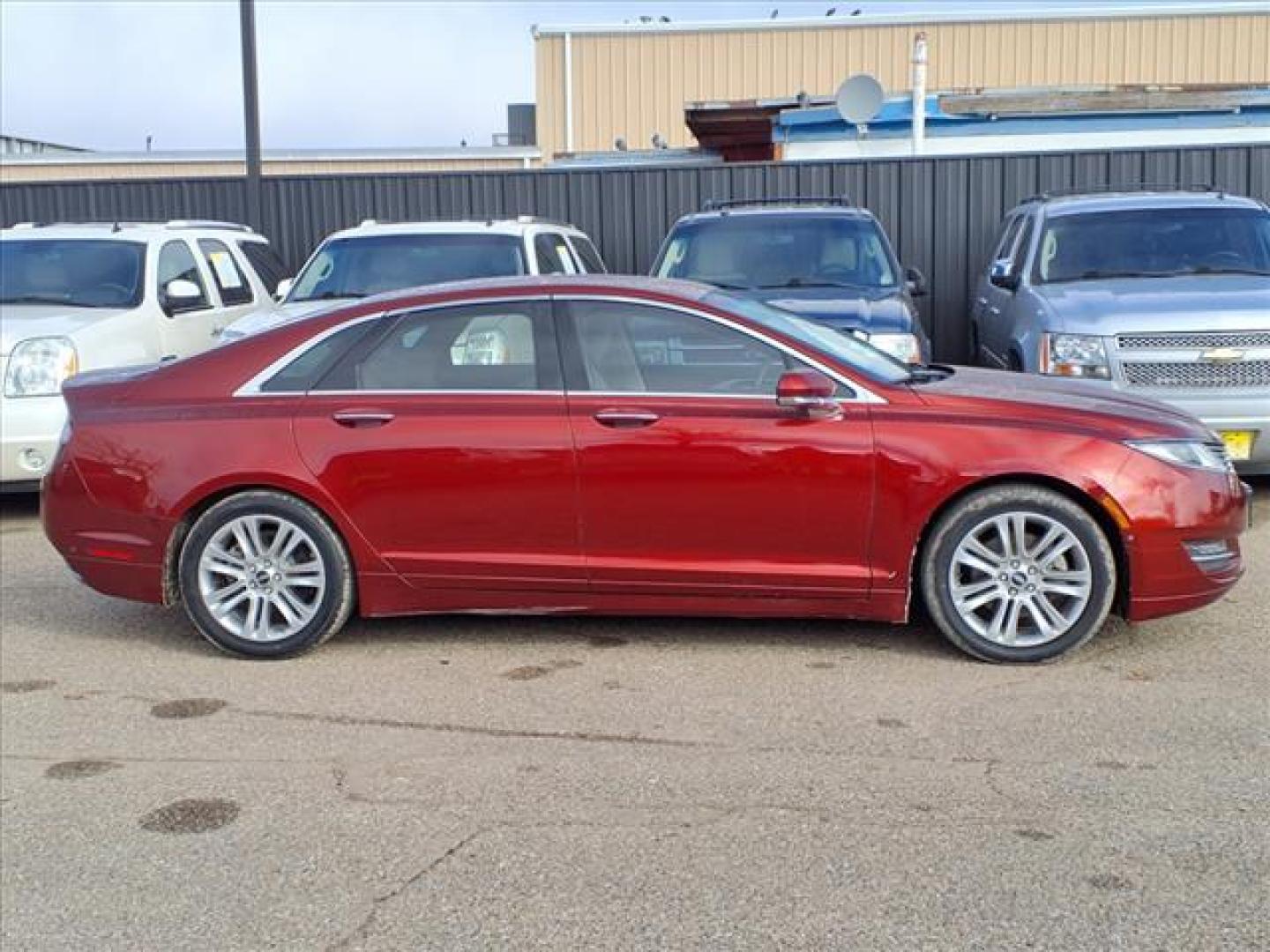 2014 Sunset Metallic D7 Lincoln MKZ Base (3LN6L2GK5ER) with an 3.7L 3.7L V6 300hp 277ft. lbs. Sequential Multiport Fuel Injection engine, 6-Speed Shiftable Automatic transmission, located at 1401 N. Hobart, Pampa, TX, 79065, (806) 665-9872, 35.549953, -100.975098 - Photo#2