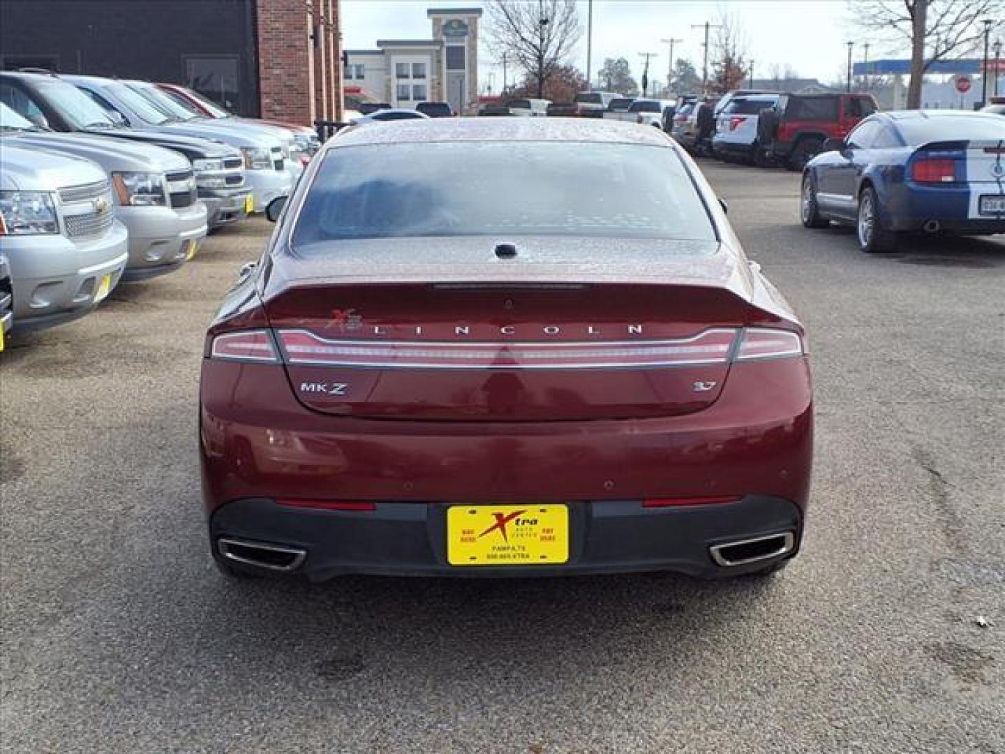 2014 Sunset Metallic D7 Lincoln MKZ Base (3LN6L2GK5ER) with an 3.7L 3.7L V6 300hp 277ft. lbs. Sequential Multiport Fuel Injection engine, 6-Speed Shiftable Automatic transmission, located at 1401 N. Hobart, Pampa, TX, 79065, (806) 665-9872, 35.549953, -100.975098 - Photo#3