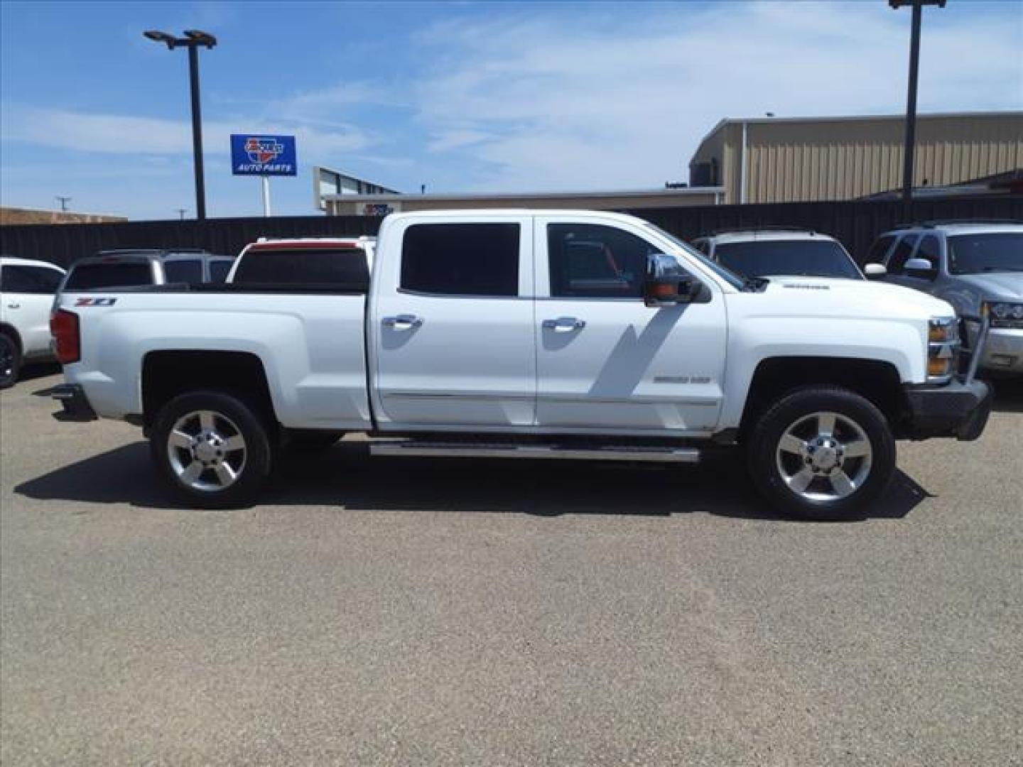 2017 Summit White Chevrolet Silverado 2500HD LTZ (1GC1KWEY7HF) with an 6.6L Duramax 6.6L Biodiesel Turbo V8 445hp 910ft. lbs. Common Rail Direct Injection engine, Allison 1000 6-Speed Shiftable Automatic transmission, located at 1401 N. Hobart, Pampa, TX, 79065, (806) 665-9872, 35.549953, -100.975098 - Photo#2